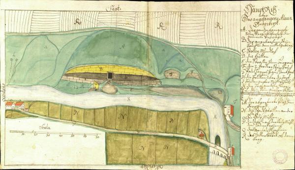 Ausschnitt aus einem alten Buch, welcher eine Zeichnung über den Bergbau mit Randnotizen zeigt