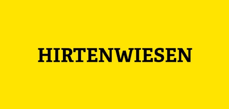 Gelbe Kachel mit Aufschrift Hirtenwiesen