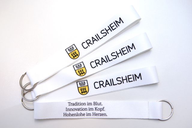 Weißer Schlüsselanhänger mir Crailsheim Logo