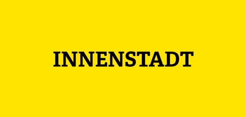 Gelbe Kachel mit Aufschrift Innenstadt