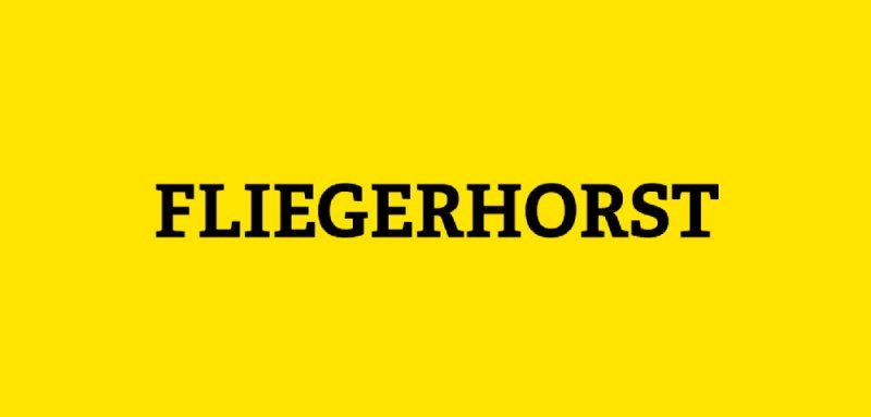 Gelbe Kachel mit Aufschrift Fliegerhorst